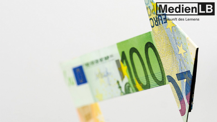 Ein Geldschein in der Form eines Pfeiles. Ein Geldschein in der Form eines Pfeiles.